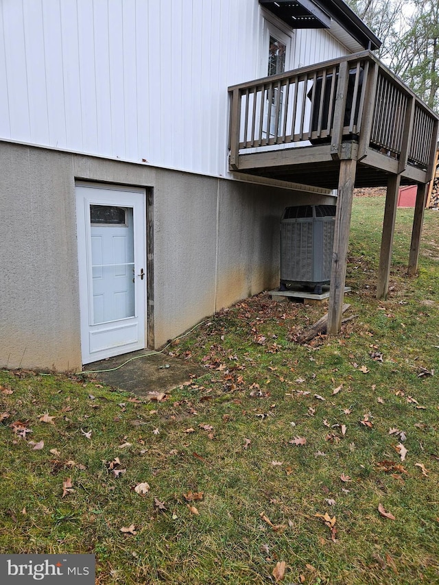 entrance to property featuring central air condition unit