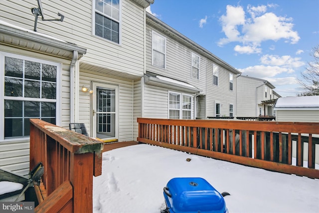 view of snow covered deck