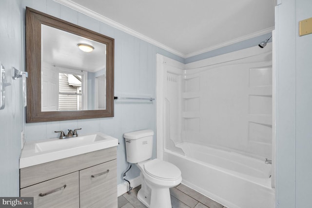 full bathroom with vanity, tile patterned floors, toilet, shower / bathing tub combination, and ornamental molding