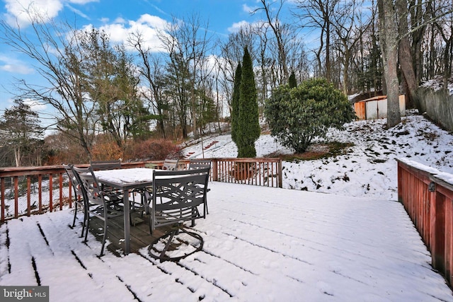 view of snow covered deck