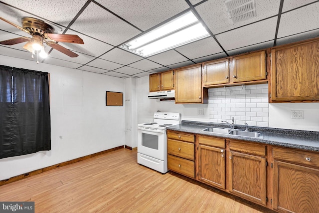 kitchen featuring backsplash, ceiling fan, sink, white electric range, and light hardwood / wood-style floors