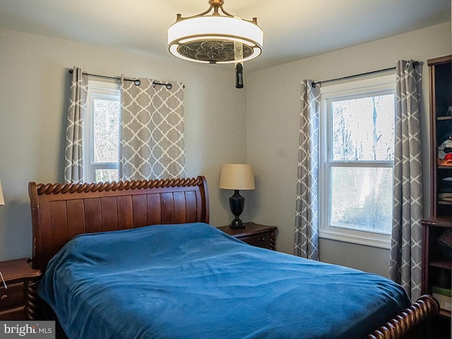 bedroom featuring multiple windows