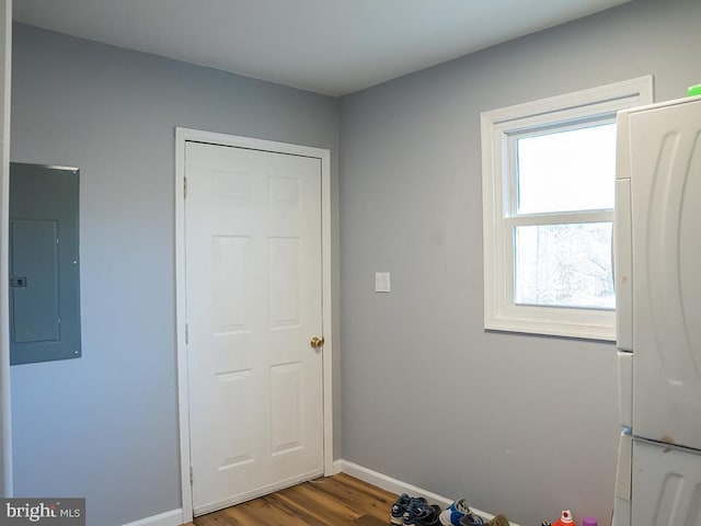 doorway to outside featuring wood-type flooring and electric panel