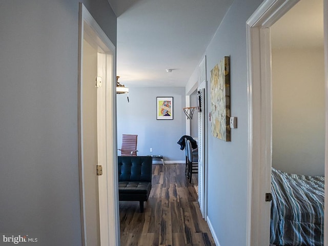 corridor with dark wood-type flooring