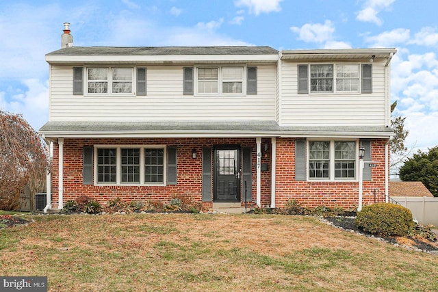 front of property featuring a front lawn