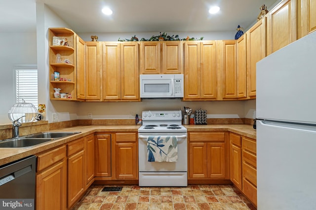 kitchen with sink and white appliances