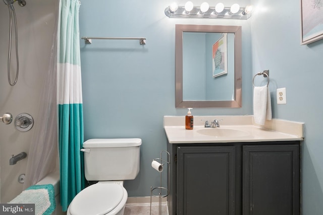 full bathroom featuring vanity, shower / bathtub combination with curtain, and toilet