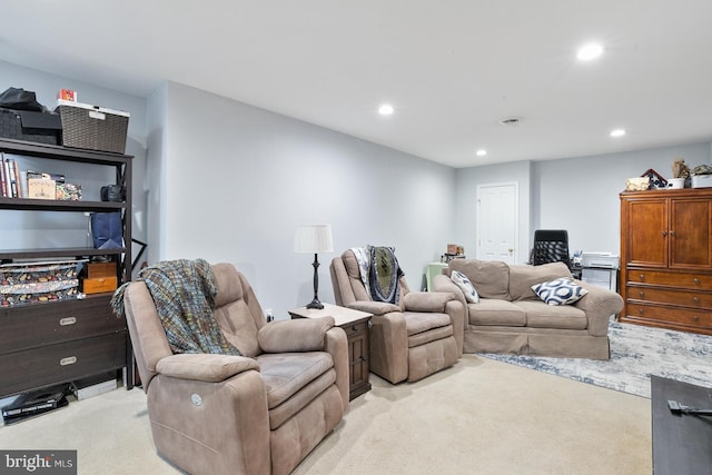 living room featuring light carpet