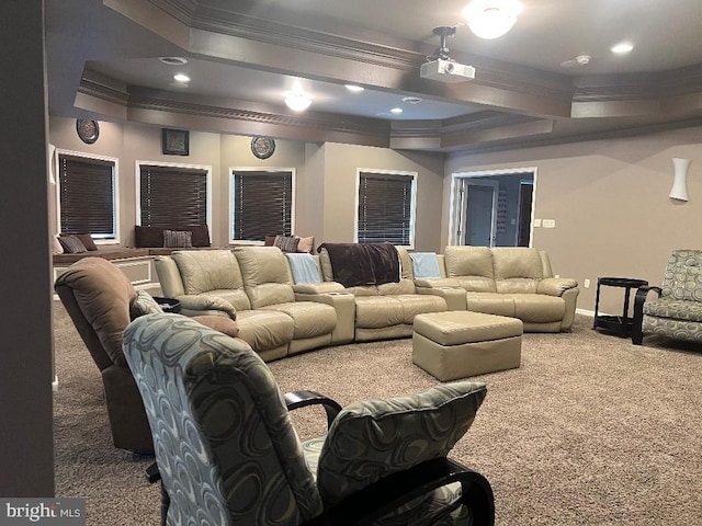 carpeted cinema room with baseboards, recessed lighting, and crown molding