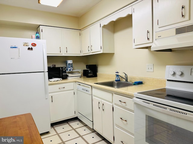 kitchen with white cabinetry, white appliances, sink, and exhaust hood