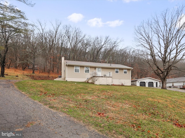 view of front of property with a front lawn