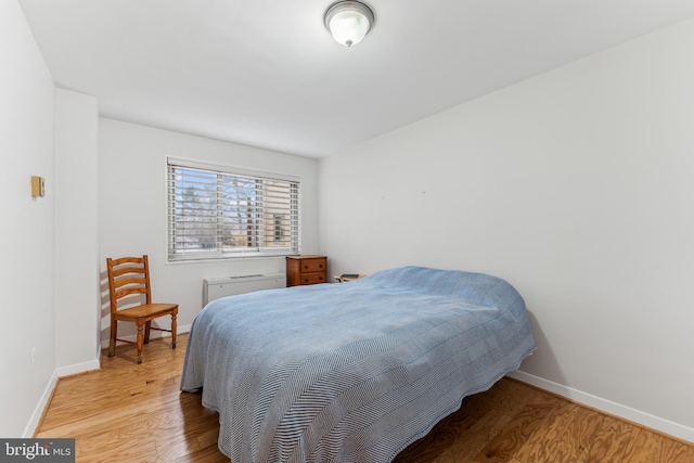 bedroom featuring light hardwood / wood-style flooring