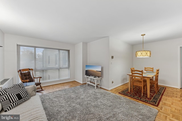 living room with parquet flooring