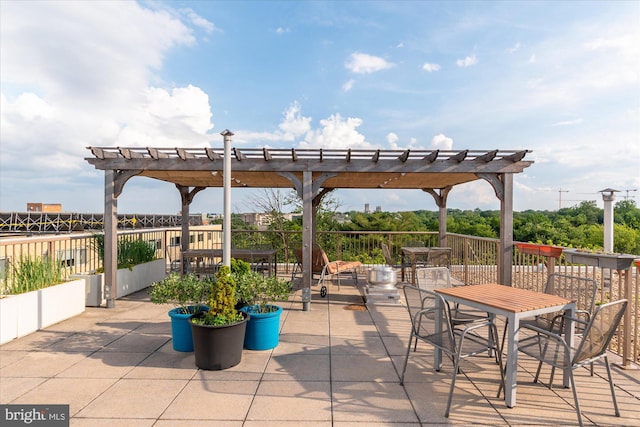 view of patio featuring a pergola