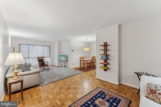 living room featuring parquet floors