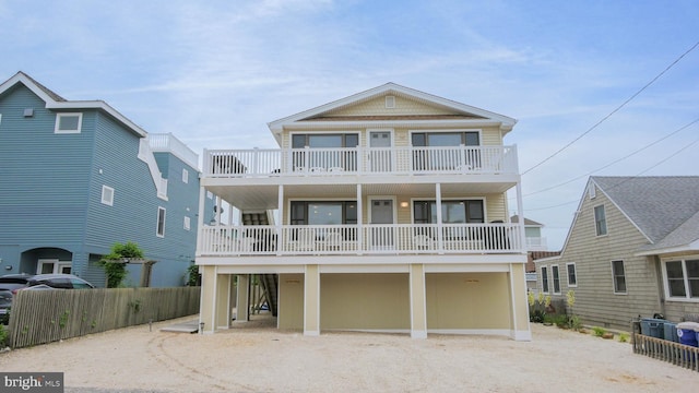 coastal inspired home featuring a balcony