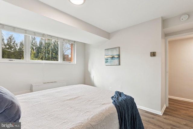 bedroom featuring hardwood / wood-style floors