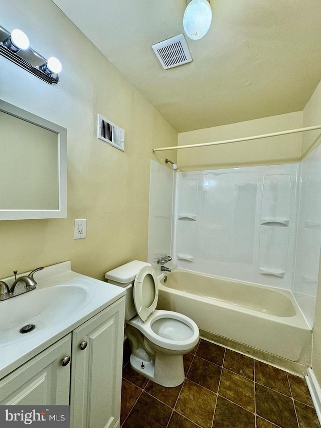 full bathroom with washtub / shower combination, toilet, and vanity