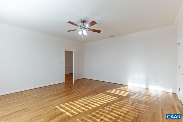 unfurnished room with ceiling fan, light hardwood / wood-style floors, and ornamental molding