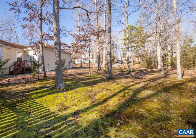 view of yard featuring a deck