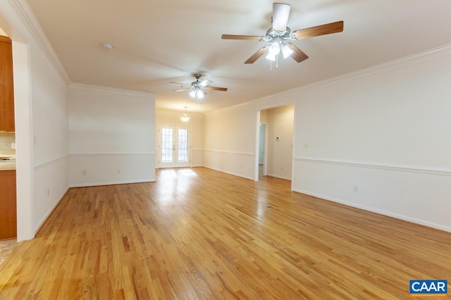 unfurnished room with french doors, light wood-type flooring, ceiling fan, and crown molding