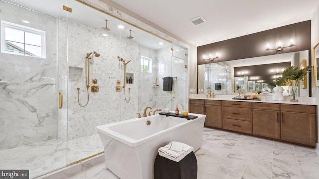 bathroom with vanity, separate shower and tub, and a wealth of natural light