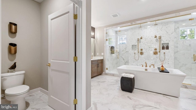 full bathroom featuring vanity, toilet, and shower with separate bathtub