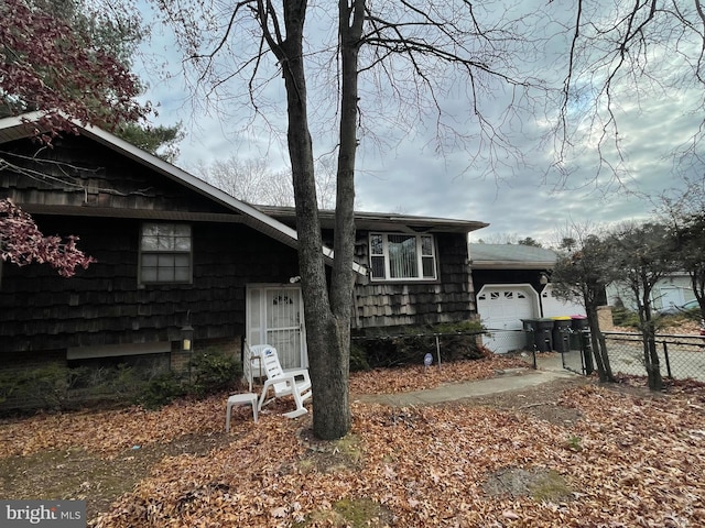 view of front of home with a garage