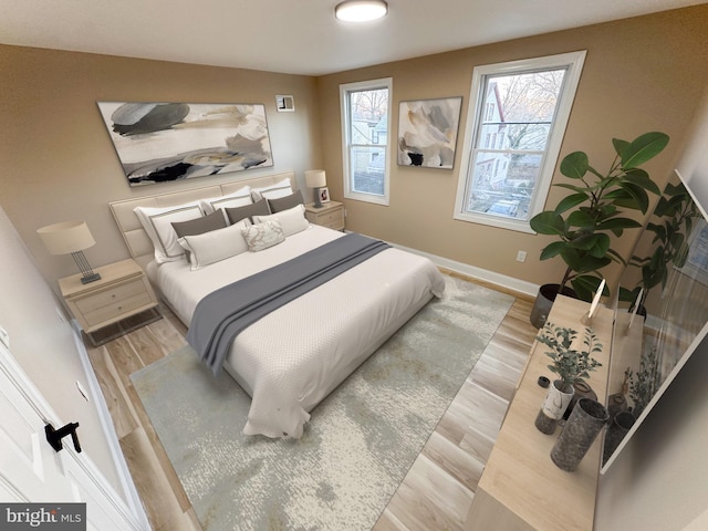 bedroom featuring light wood-type flooring