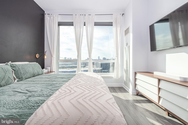 bedroom featuring light hardwood / wood-style floors