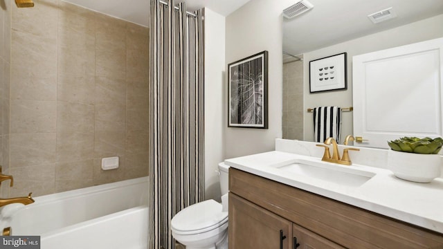 full bathroom featuring vanity, toilet, and shower / bathtub combination with curtain