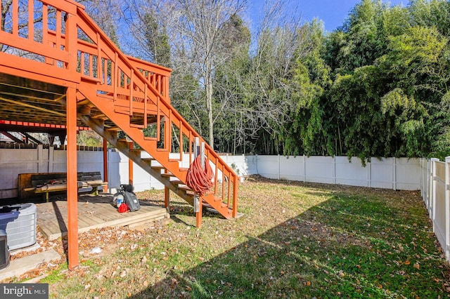 view of yard featuring a wooden deck