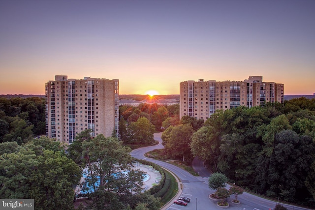 aerial view at dusk with a city view