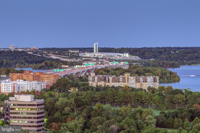 bird's eye view with a view of city and a water view