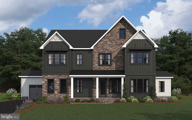 view of front facade with covered porch, a garage, and a front lawn