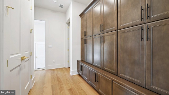 mudroom with light wood-type flooring