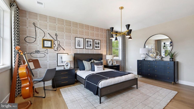 bedroom featuring light hardwood / wood-style flooring