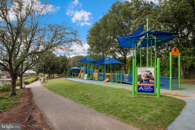 view of play area featuring a lawn