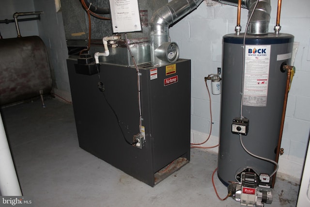 utility room featuring gas water heater