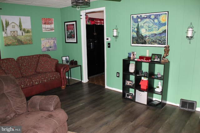 living room with dark hardwood / wood-style floors