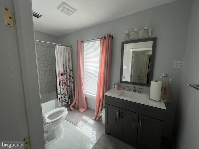 full bathroom featuring vanity, toilet, a wealth of natural light, and shower / bath combo with shower curtain