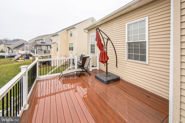 deck featuring a lawn