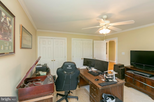 office area featuring light carpet, ornamental molding, and ceiling fan