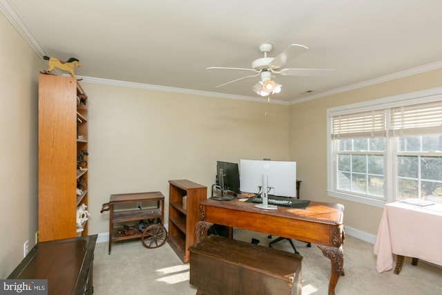 office space with crown molding, light carpet, and ceiling fan