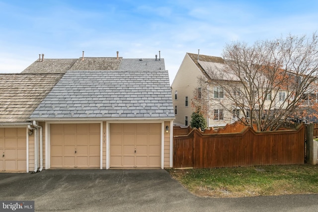 exterior space with a garage