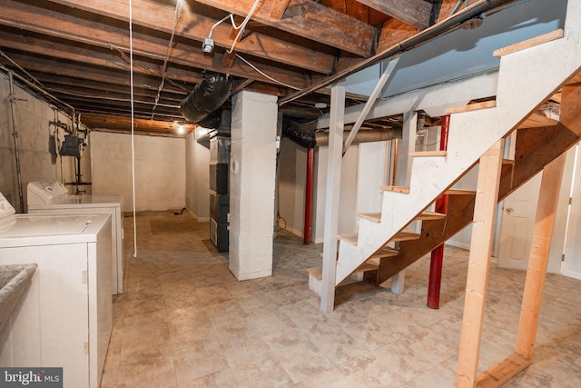 basement with washing machine and dryer