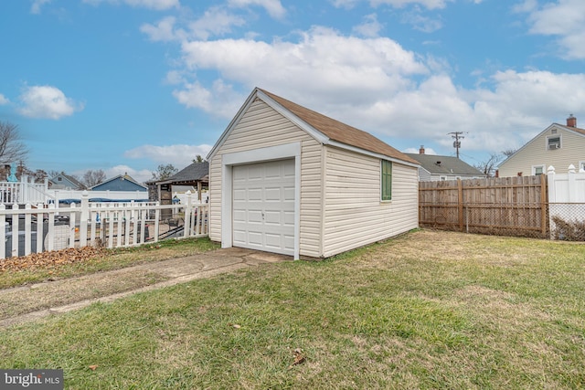 garage with a lawn