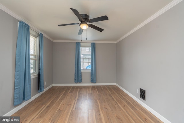 unfurnished room featuring crown molding, ceiling fan, and hardwood / wood-style flooring