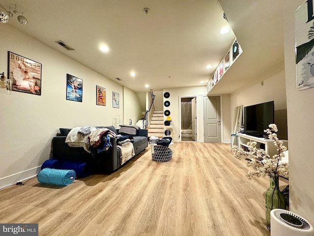 living room with light hardwood / wood-style floors