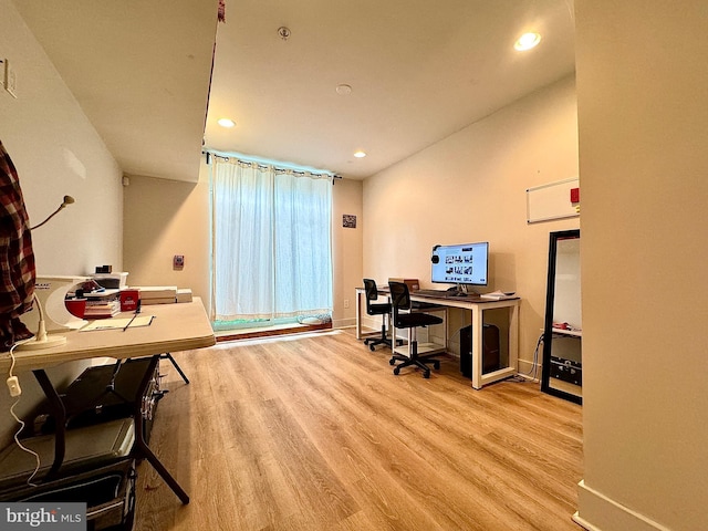 office space with light hardwood / wood-style floors